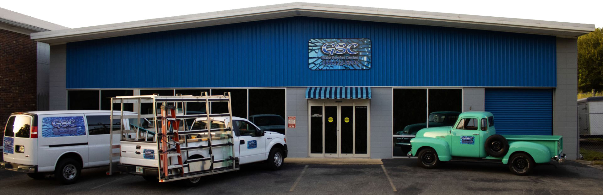 Glass Service Center of Tallahassee business location with company trucks.
